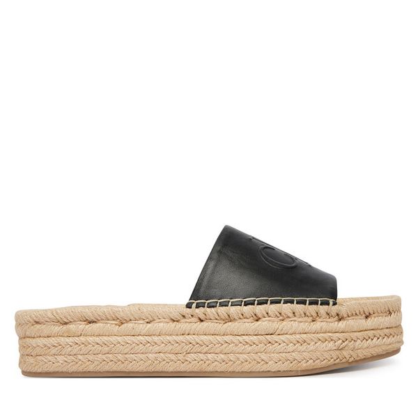 Espadryle Calvin Klein. Czarne espadryle Calvin Klein, bez wzorów, bez obcasa, bez zapięcia. Za 302.99 zł.