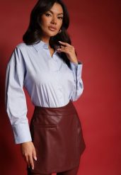 Jasnoniebieska Casualowa Koszula z Bawełny Naliraella. Niebieskie koszule Renee, l, bez wzorów, z bawełny, biznesowe, bez kołnierzyka, bez ramiączek. Za 89.99 zł.