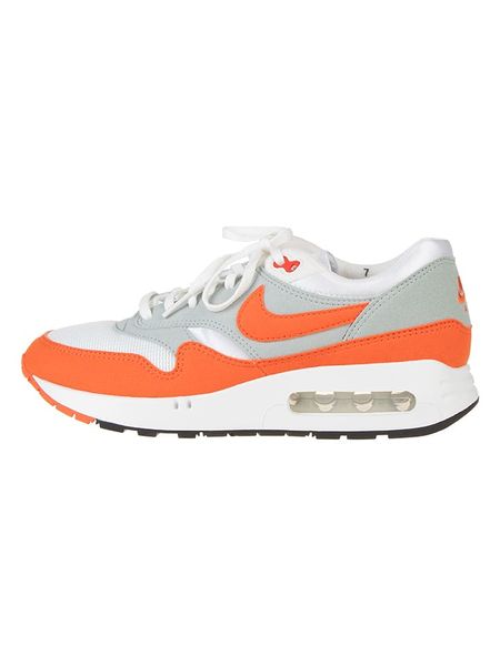 Nike Skórzane sneakersy "Air Max 1 '86 OG" w kolorze pomarańczowo-szaro-białym rozmiar: 40. Pomarańczowe trampki Nike, bez wzorów, z materiału, bez zapięcia. Za 440.28 zł.