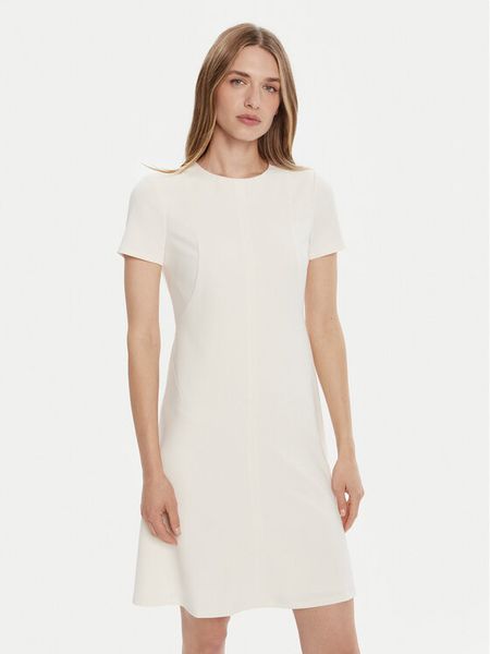 Calvin Klein Sukienka koktajlowa LV044C064G Écru Slim Fit. Sukienki Calvin Klein, bez wzorów, z syntetyku, wizytowe, bez kołnierzyka, bez ramiączek. Za 479.99 zł.