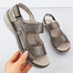 Skórzane sandały damskie na rzep metaliczne brązowe Rieker 60462-90. Brązowe sandały Rieker, bez wzorów, ze skóry, bez obcasa, bez zapięcia. Za 349.99 zł.