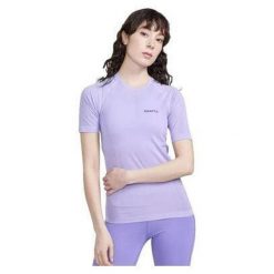 Koszulka damska Craft ADV Cool Intensity. Niebieskie bluzki Craft, bez wzorów, z tkaniny, casualowe, bez kołnierzyka, bez ramiączek. Za 287.00 zł.