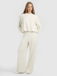 4F Spodnie dresowe z szerokimi nogawkami z modalem damskie - beżowe XL. Brązowe spodnie dresowe 4f, xl, bez wzorów, z dresówki. Za 189.99 zł.