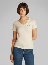 CALVIN KLEIN JEANS Koszulka w kolorze kremowym rozmiar: M. Brązowe bluzki Calvin Klein Jeans, m, bez wzorów, z bawełny, bez kołnierzyka, bez ramiączek. Za 158.47 zł.
