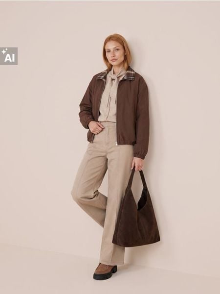 Jeansy wide leg z przeszyciami - brązowy. Brązowe jeansy Sinsay, bez wzorów. Za 69.99 zł.
