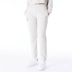Spodnie sportowe damskie New Era 60435304. Białe spodnie dresowe New Era, m, bez wzorów, z dresówki. Za 537.00 zł.