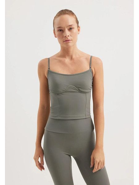 Rethinkit Top funkcyjny "True to body" w kolorze zielonym rozmiar: L. Zielone topy Rethinkit, l, bez wzorów, z materiału, bez kołnierzyka, bez ramiączek. Za 109.26 zł.