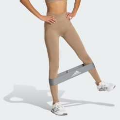 Legginsy Workout Essentials Knit Scrunch 7/8. Brązowe legginsy Adidas, bez wzorów, z podwyższonym stanem. Za 239.00 zł.