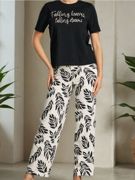 Bawełniana piżama dwuczęściowa z napisem - czarny. Czarne piżamy Sinsay, bez wzorów, z bawełny, bez ramiączek. Za 49.99 zł.