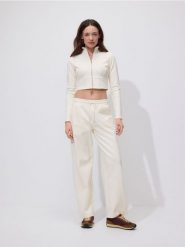 Bluza z wysoką stójką - jasnożółty. Żółte bluzy Reserved, l, bez wzorów, z bawełny, bez kaptura. Za 89.99 zł.