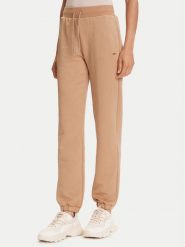 Guess Spodnie dresowe V5YB06 KBSL2 Beżowy Regular Fit. Brązowe spodnie dresowe Guess, l, z aplikacjami, z dresówki. Za 369.99 zł.