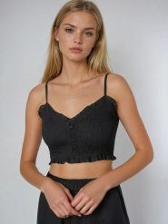 Weekday Top w kolorze czarnym rozmiar: M. Czarne topy Weekday, m, bez wzorów, bez kołnierzyka, bez ramiączek. Za 66.00 zł.