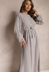 Ciemnoszara Rozkloszowana Sukienka Maxi Plisowana Wiązana w Pasie Terilla. Szare sukienki Renee, bez wzorów, z materiału, bez kołnierzyka, bez ramiączek, maxi, koszulowe. Za 99.99 zł.