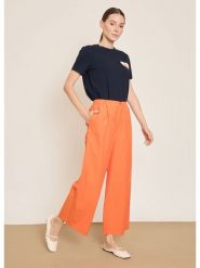 BGN Spodnie w kolorze pomarańczowym rozmiar: 38. Pomarańczowe spodnie materiałowe BGN, na co dzień, bez wzorów, z materiału. Za 121.99 zł.