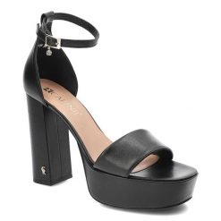 Czarne Sandały Carinii Eleganckie Skórzane Buty. Czarne sandały Carinii, bez wzorów, ze skóry, eleganckie, bez obcasa, na obcasie, bez zapięcia. Za 369.00 zł.