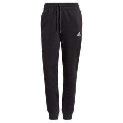 Spodnie damskie adidas Essentials Slim. Białe spodnie dresowe Adidas, xs, bez wzorów, z dresówki, na fitness i siłownię. W wyprzedaży za 144.35 zł.