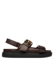 Clarks Sandały Aristella Bay 26185806 Brązowy. Brązowe sandały Clarks, bez wzorów, ze skóry, bez obcasa, na płaskiej podeszwie, bez zapięcia. Za 469.99 zł.