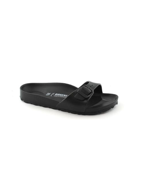 Klapki damskie Birkenstock Eva Madrid Black Eva. Czarne klapki Birkenstock, bez wzorów, z materiału, bez obcasa. Za 251.00 zł.