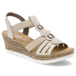 Beżowe Sandały Rieker Eleganckie Obuwie Damskie Z Ozdobami. Brązowe sandały Rieker, z aplikacjami, eleganckie, bez obcasa, na koturnie, bez zapięcia. Za 319.00 zł.