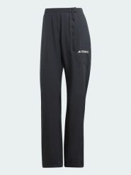 Adidas Spodnie przeciwdeszczowe w kolorze czarnym rozmiar: 40. Czarne spodnie dresowe Adidas, bez wzorów. Za 176.08 zł.
