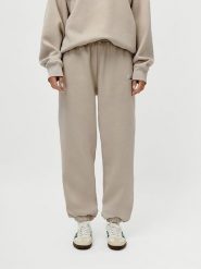 LeGer Spodnie dresowe "Maxime" w kolorze beżowym rozmiar: 40. Brązowe spodnie dresowe LeGer, bez wzorów, z dresówki. Za 100.99 zł.