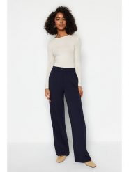 Trendyol Spodnie w kolorze granatowym rozmiar: 40. Niebieskie spodnie materiałowe Trendyol, bez wzorów, z materiału, z podwyższonym stanem. Za 60.99 zł.