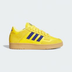 Buty Rapid Court Low. Niebieskie obuwie sportowe Adidas, przed kostkę, bez zapięcia. W wyprzedaży za 229.75 zł.