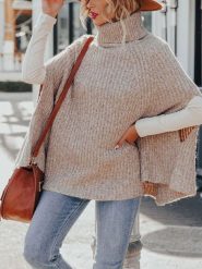 Milan Kiss Ponczo w kolorze beżowym rozmiar: L. Brązowe golfy Milan Kiss, l, bez wzorów, z polaru, bez ramiączek. Za 200.13 zł.