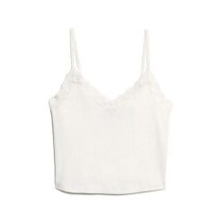 Krótki top z koronkowymi wykończeniami dla kobiet Superdry Athletic Essentials. Białe topy Superdry, l, bez wzorów, z koronki, bez kołnierzyka, bez ramiączek. Za 104.45 zł.
