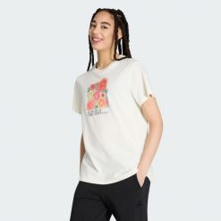 Luźna Koszulka Z Kwiatową Grafiką 2. Białe bluzki Adidas, bez wzorów, sportowe, bez kołnierzyka, bez ramiączek. Za 149.00 zł.