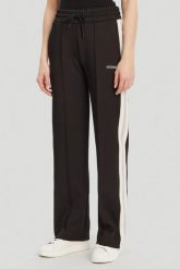 GUESS Czarne damskie dresowe spodnie Yarrow. Czarne spodnie dresowe Guess, s, z aplikacjami, z dresówki. W wyprzedaży za 259.99 zł.