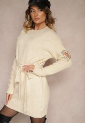 Beżowa Sukienka Sweterkowa z Wełną Ozdobiona Cyrkoniami Paskiem i Wycięciami Zolida. Brązowe sukienki Renee, na co dzień, bez wzorów, z wełny, eleganckie, bez kołnierzyka, bez ramiączek, mini, dopasowane. W wyprzedaży za 135.99 zł.
