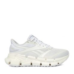 Sneakersy Reebok. Białe obuwie sportowe Reebok, bez zapięcia, do biegania. Za 489.99 zł.