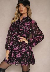 Czarno-Fioletowa Sukienka o Rozkloszowanym Kroju w Kwiaty z Gumką w Pasie Ozdobiona Falbankami Zinilita. Czarne sukienki Renee, na co dzień, l, bez wzorów, eleganckie, bez kołnierzyka, bez ramiączek, mini, dopasowane. Za 139.99 zł.