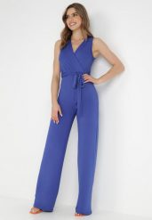 Granatowy Kombinezon Chionadina. Niebieskie sukienki Born2be, l, bez wzorów, eleganckie, bez kołnierzyka, bez ramiączek, maxi, kopertowe. Za 139.99 zł.