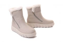 RIEKER Y3581-60 beige, botki damskie. Brązowe botki Rieker, na zimę, bez wzorów, bez obcasa, na koturnie, bez zapięcia. Za 399.90 zł.