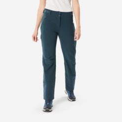 Spodnie turystyczne damskie Quechua SH500 Warm. Niebieskie spodnie sportowe QUECHUA, na zimę, xs, bez wzorów, z materiału, trekkingowe. Za 249.99 zł.