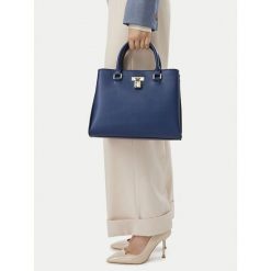 Torebka Nine West. Niebieskie torebki klasyczne Nine West, bez wzorów, bez dodatków. Za 299.99 zł.