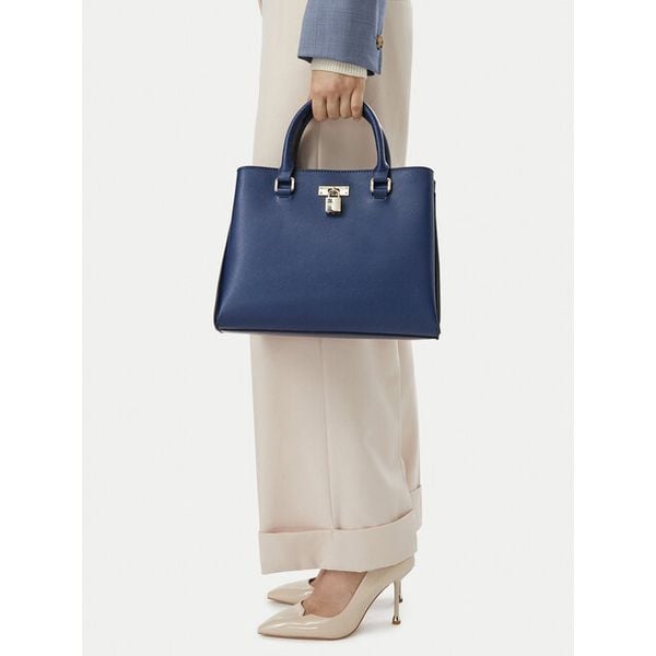 Torebka Nine West. Niebieskie torebki klasyczne Nine West, bez wzorów, bez dodatków. Za 299.99 zł.