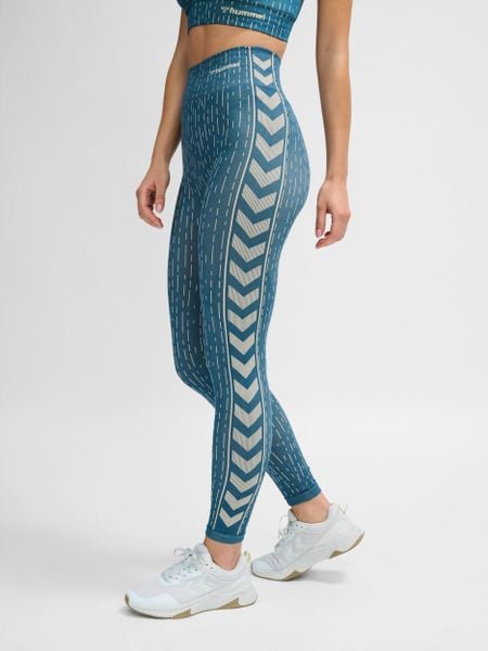 Damskie legginsy bezszwowe Hummel MT Drops. Niebieskie legginsy Hummel, s, bez wzorów, z dzianiny, z podwyższonym stanem. Za 167.00 zł.