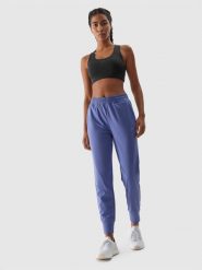 4F Spodnie treningowe szybkoschnące damskie - granatowe XL. Niebieskie spodnie dresowe 4f, l, bez wzorów, z dzianiny. W wyprzedaży za 99.99 zł.