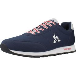 Kapcie LE COQ SPORTIF RACERONE_2 Niebieski. Niebieskie obuwie domowe Le Coq Sportif, bez wzorów, z syntetyku, bez zapięcia. Za 193.99 zł.