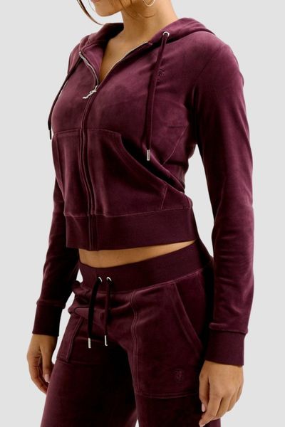 JUICY COUTURE Fioletowa damska bluza Robertson Hoodie, Rozmiar M. Fioletowe bluzy Juicy Couture, m, bez wzorów, z elastanu, z kapturem. W wyprzedaży za 340.99 zł.