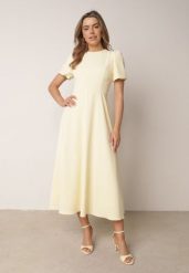 Żółta Elegancka Sukienka VICES o Rozkloszowanym Kroju z Krótkim Rękawem Aezith. Żółte sukienki Born2be, na co dzień, l, bez wzorów, eleganckie, bez kołnierzyka, bez ramiączek, maxi, proste. Za 219.99 zł.
