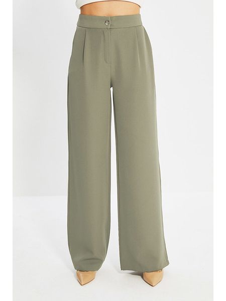 Trendyol Spodnie w kolorze khaki rozmiar: 34. Brązowe spodnie materiałowe Trendyol, bez wzorów, z materiału. Za 85.95 zł.