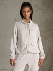 Rozpinana bluza ze stójką soft touch - kremowy. Białe bluzy Sinsay, l, bez wzorów, z dzianiny, bez kaptura. Za 35.99 zł.