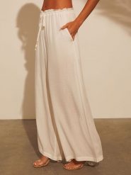 Milan Kiss Spodnie w kolorze kremowym rozmiar: S. Brązowe spodnie materiałowe Milan Kiss, s, bez wzorów, z materiału. Za 152.99 zł.