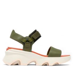 Sandały Sorel. Zielone sandały Sorel, bez wzorów, bez obcasa, na koturnie, bez zapięcia. Za 399.99 zł.
