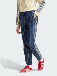 Adidas Spodnie dresowe Pinstripe Firebird Track Pant KR7037 Granatowy Regular Fit. Niebieskie spodnie dresowe Adidas, l, bez wzorów, z dresówki. Za 399.99 zł.
