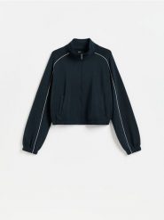 Bluza z kontrastową lamówką - granatowy. Niebieskie bluzy sportowe Reserved, l, bez wzorów, z dzianiny, bez kaptura. Za 139.99 zł.